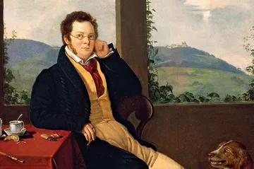 Pintura de Franz Schubert, homem branco, sentado numa cadeira de madeira e apoiado em um dos braços numa mesa com toalha vermelha. Ao fundo, é possível ver morros verdes e arvores.
